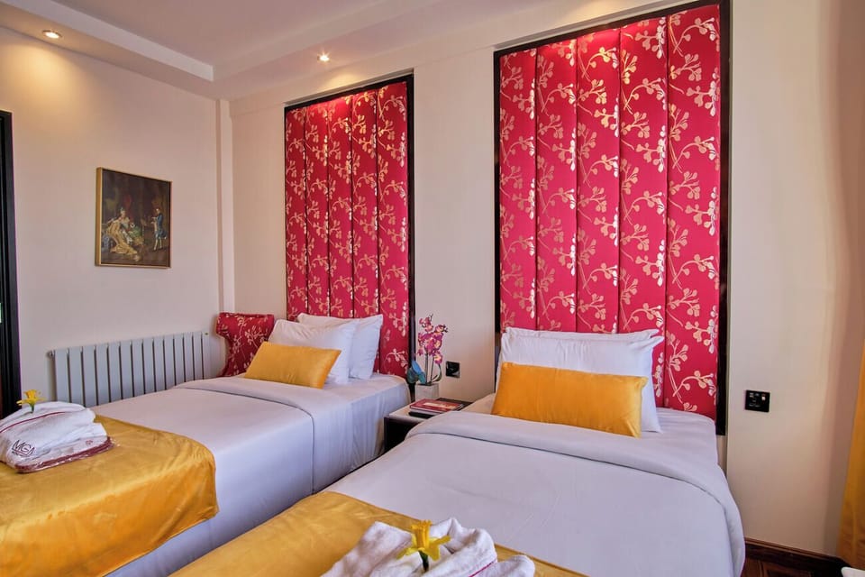 Unwind in crisp linens surrounded by bold, boutique design.
