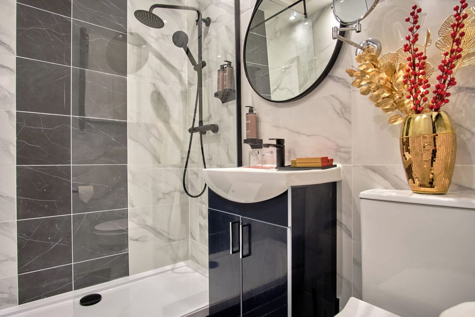 Start your day in a sparkling bathroom with rainfall shower.