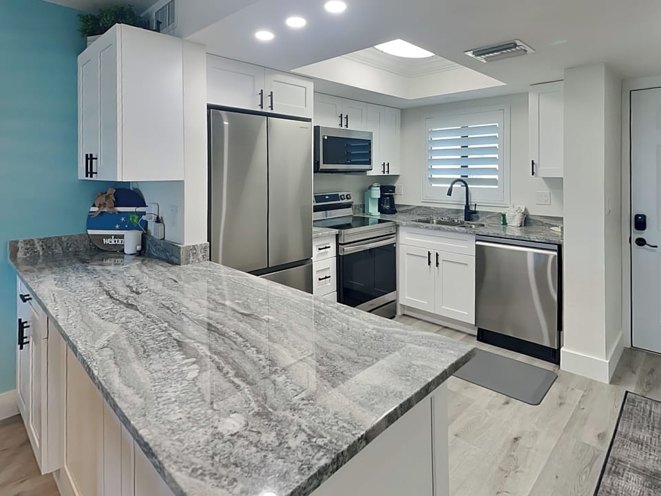 Fully Equipped Kitchen with Stainless Steel Appliances