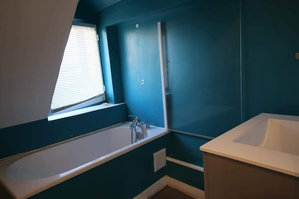 Salle de Bain avec baignoire