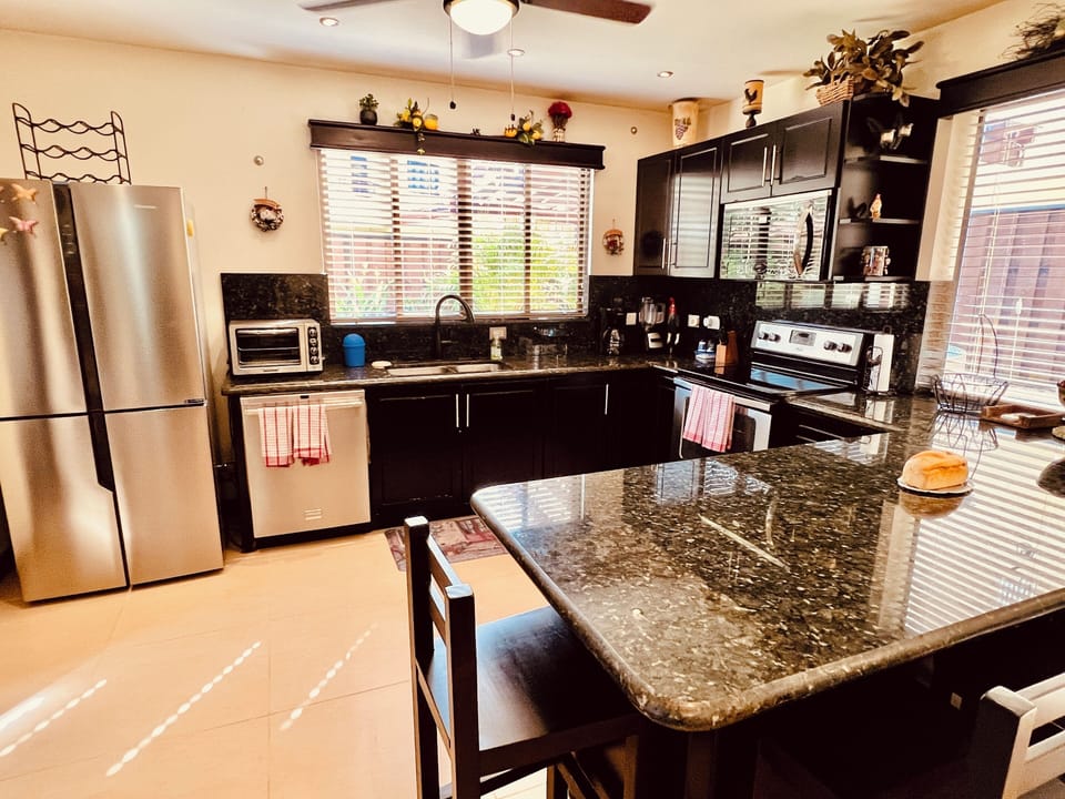 Full Kitchen with granite countertops.