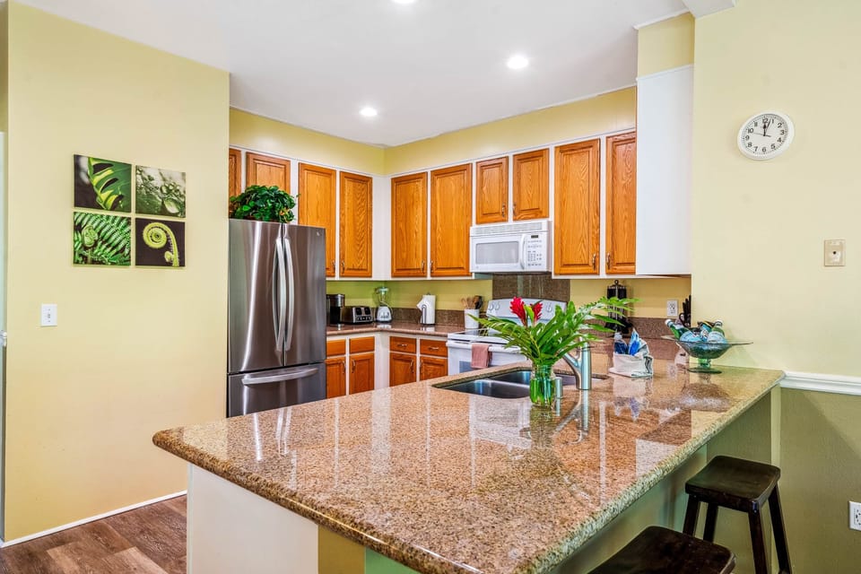 Step into this stunning kitchen, where modern elegance meets cozy charm. Perfect for culinary advent