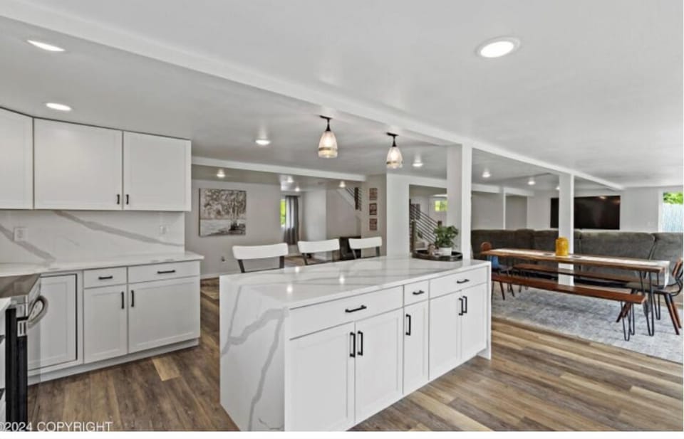 Spacious kitchen with essentials and open design for easy, convenient cooking.