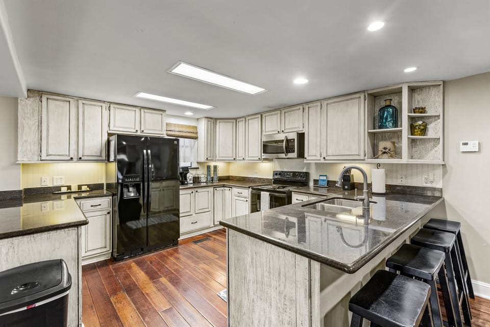Kitchen features various small appliances