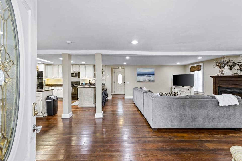Open concept living room, dining room, and kitchen