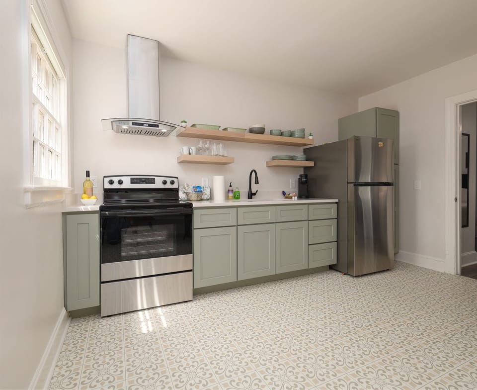 Newly renovated kitchen, all new cabinets, countertops, stainless, steel appliances, dishes and cookware