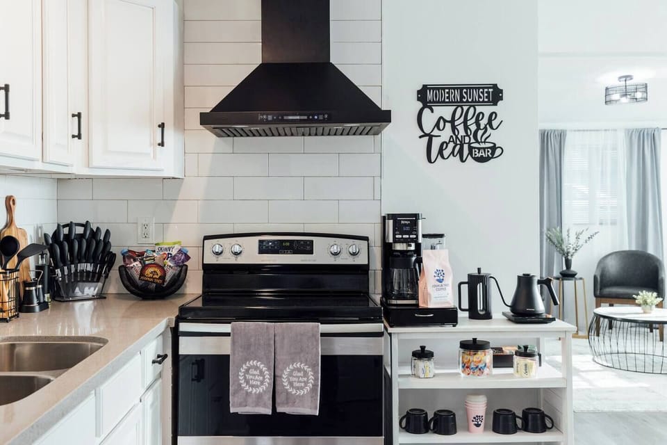 Enjoy our sleek modern fully equipped kitchen and our cozy stocked coffee & tea bar.