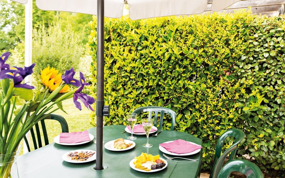 Enjoy reminiscing about your day while sipping a glass of wine outside on the patio.