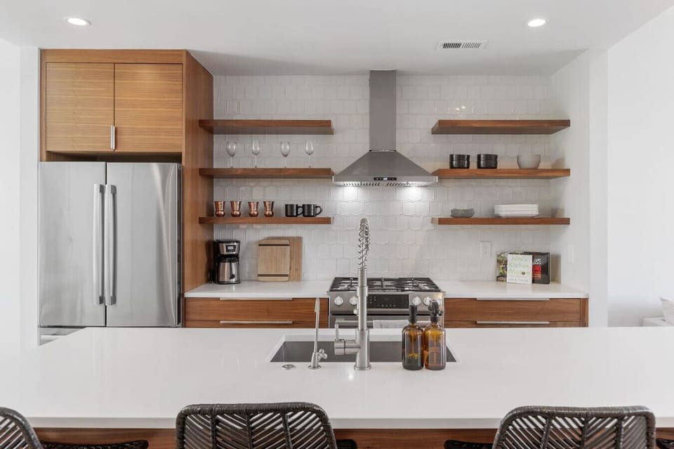 Fully-stocked, modern kitchen suitable for any chef! We provide all the essential supplies and utensils you'll need for your morning coffee routine and any other cooking adventures.
