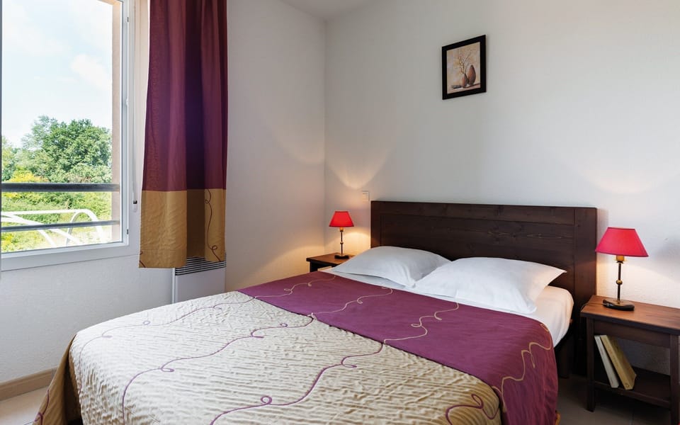 The cozy bedroom features a Double bed.