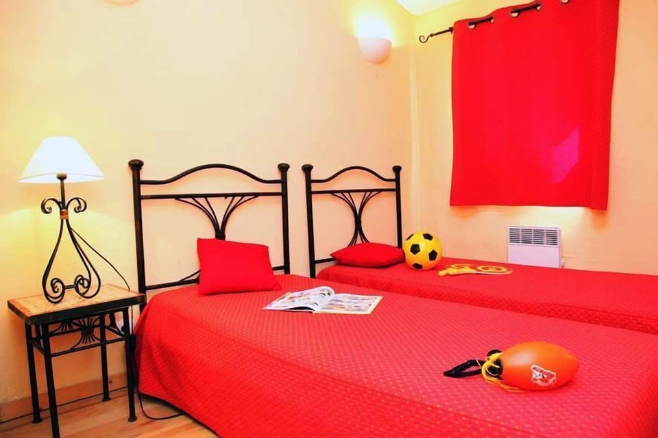 Get a good night's rest in the cozy third bedroom with 2 Single beds.