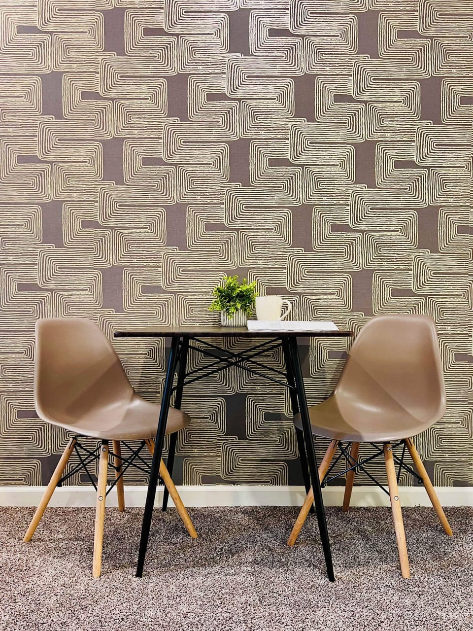 LIVING ROOM | SECOND FLOOR: If you need more seating for meals, or just a quiet place to drink coffee, you can enjoy this bistro table away from the busyness of the kitchen.