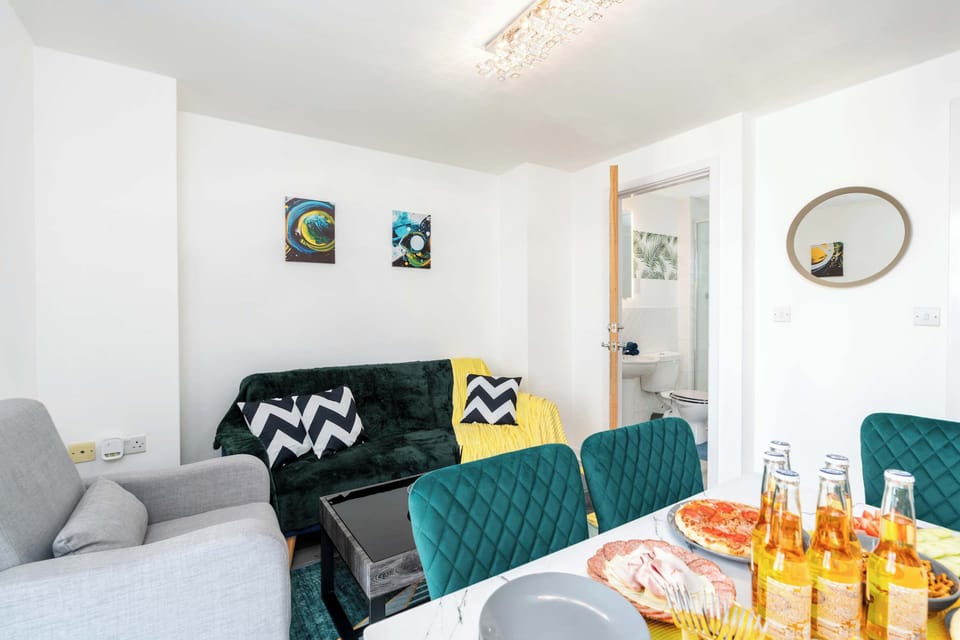Living and Dining Area | Access to Bathroom with Shower