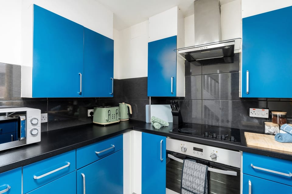 Kitchen in Blue with Everything You Need to Prepare Tasteful Meals