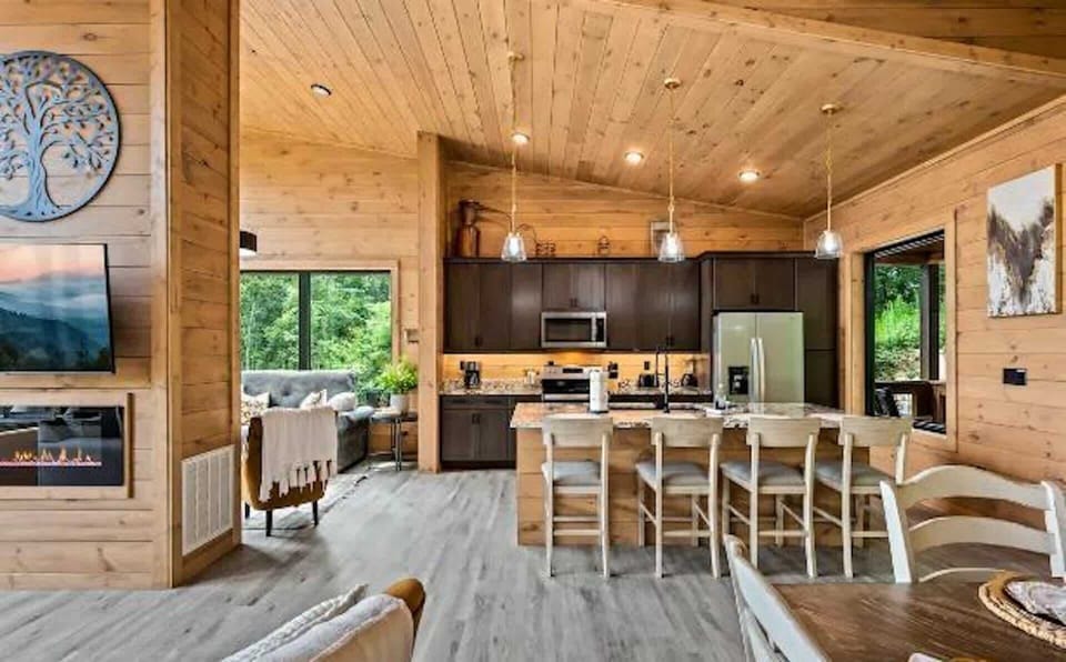 The inviting open kitchen offers ample space & every home comfort