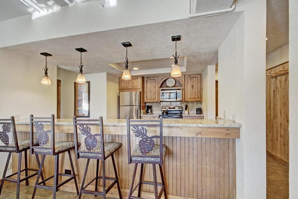 Keep the cook company at the breakfast bar.