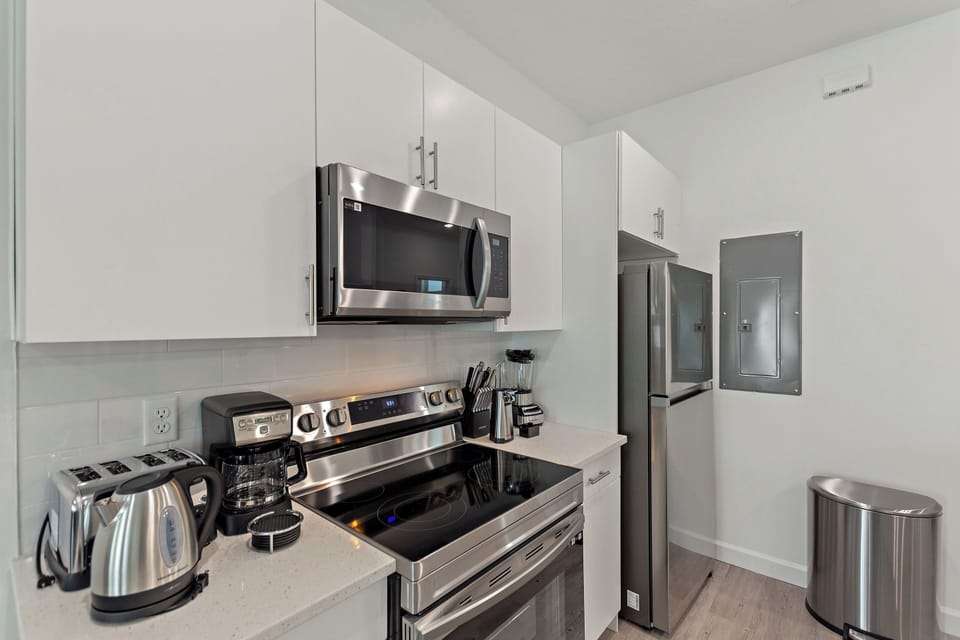 Fully Equipped Kitchen with Stainless Steel Appliances