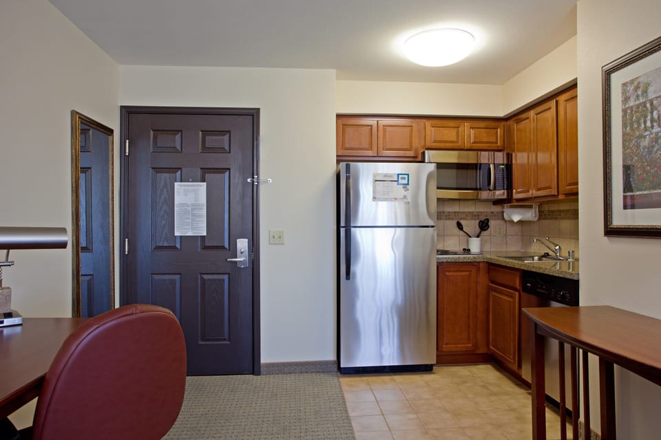 Fully equipped kitchen with modern appliances and stylish cabinetry.