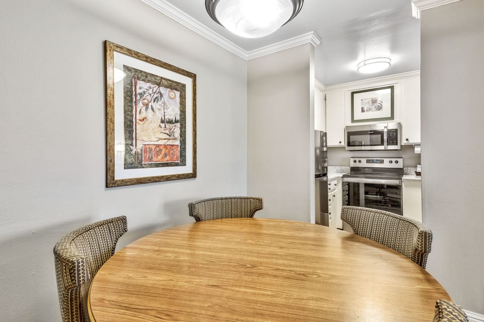 A welcoming dining space with a seamless flow into the kitchen, perfect for enjoying meals and meaningful conversations.