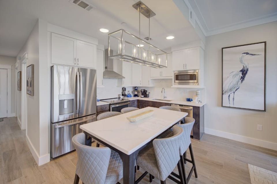 Enjoy this bright space with a sleek island for dining and socializing.