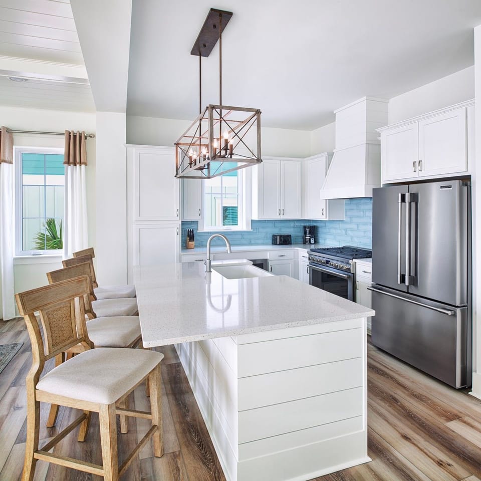 If you love to cook, this is the home for you! The spacious kitchen features plenty of counter space, a large refrigerator and freezer, a 36-inch gas range, and more!