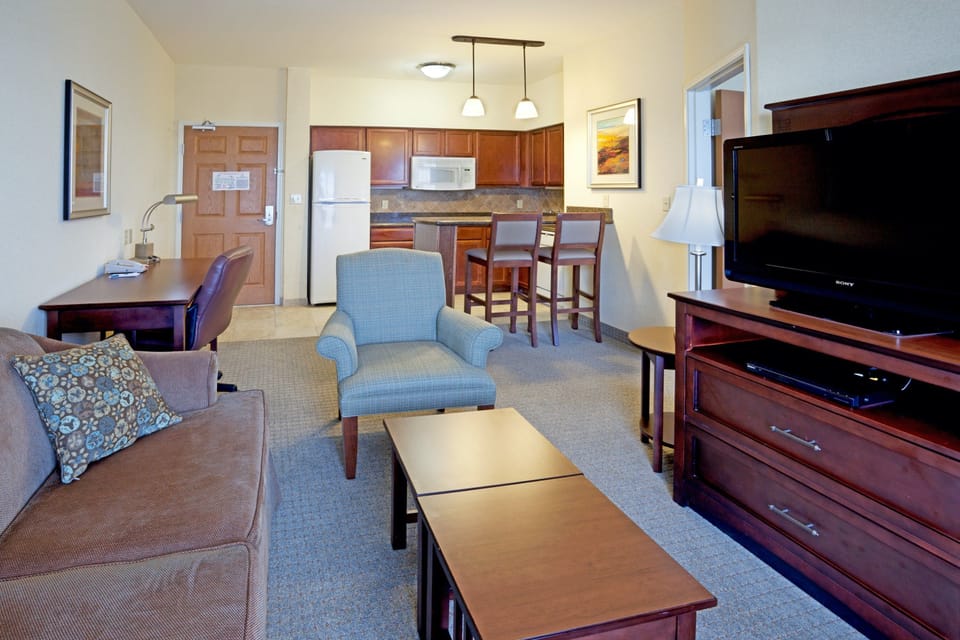 Sink into the cozy sofa after a day exploring the area.