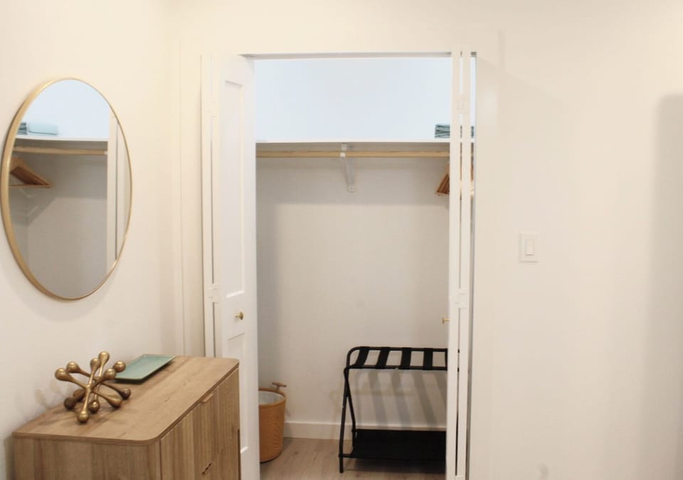 Each bedroom has luggage rack and hangers