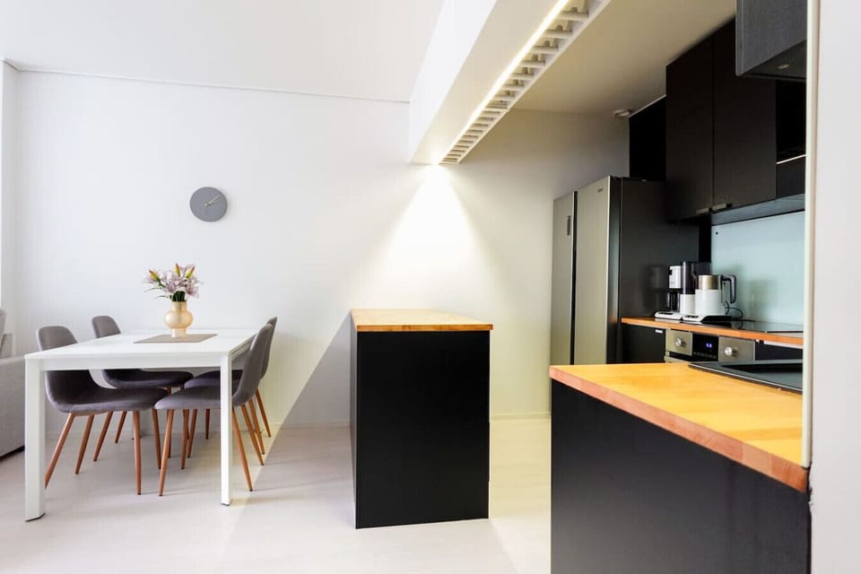 Modern appliances & cozy dining area for a hassle-free stay.