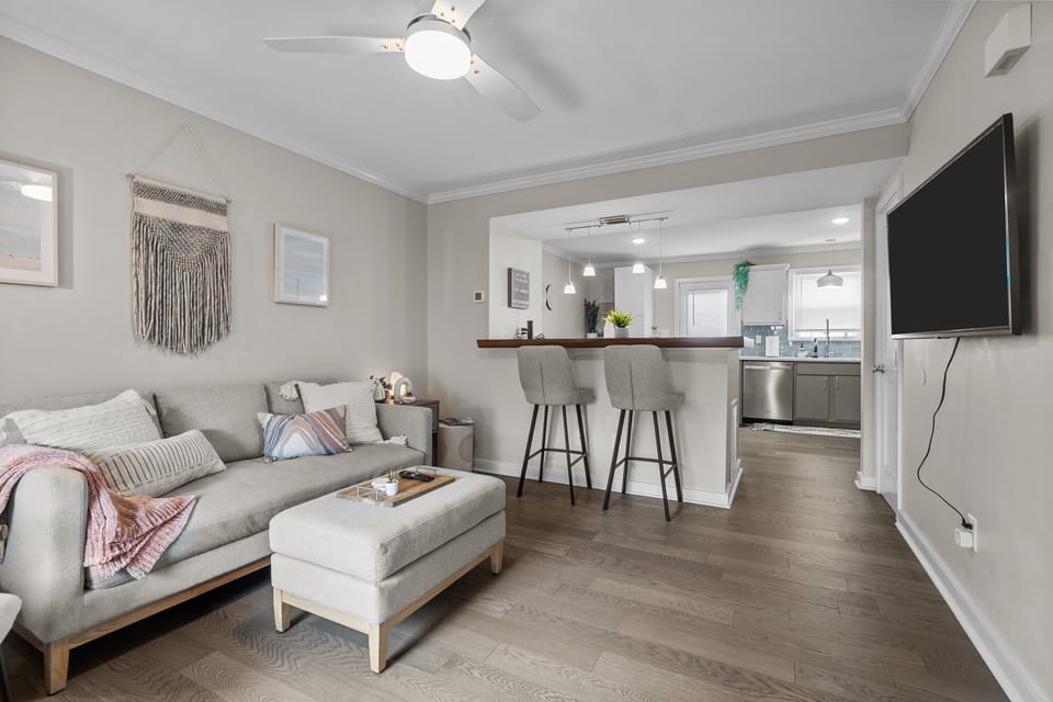 Spacious open concept downstairs. Half bath between kitchen and living room.