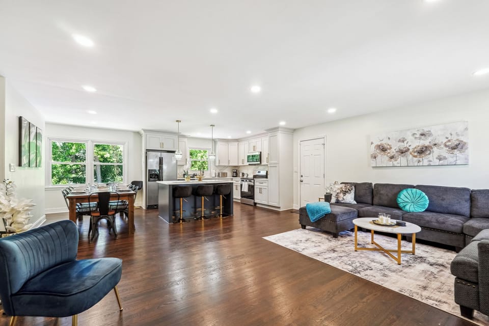 MainLevel Open Concept: Living Room with 75" Smart TV & Garage access