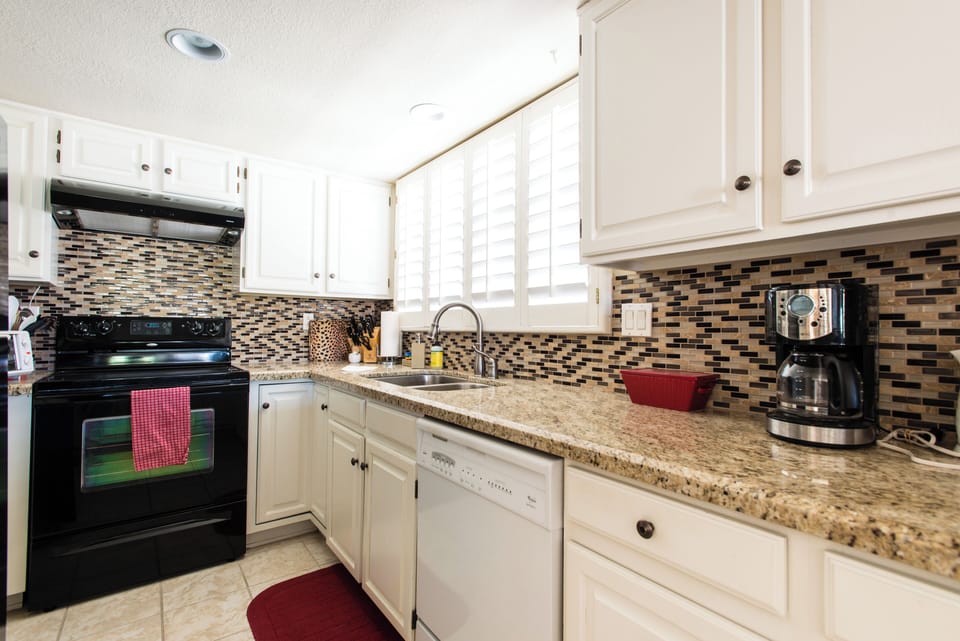 Wonderful kitchen. Lovely long granite counters, lots of cupboards & supplies.  