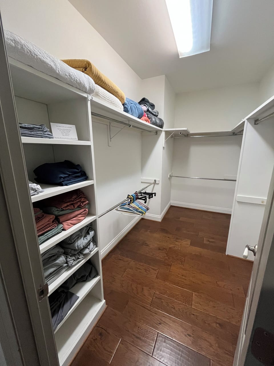 Master Bedroom closet with extra linens for every bed in the home.