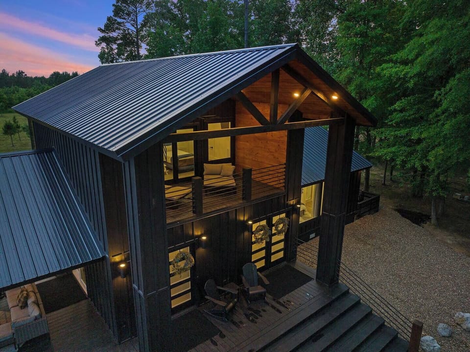 Escape to the tranquil elegance of Dogwood Manor!  Nestled in peaceful seclusion, this charming retreat offers the perfect blend of comfort, nature, and timeless beauty. 