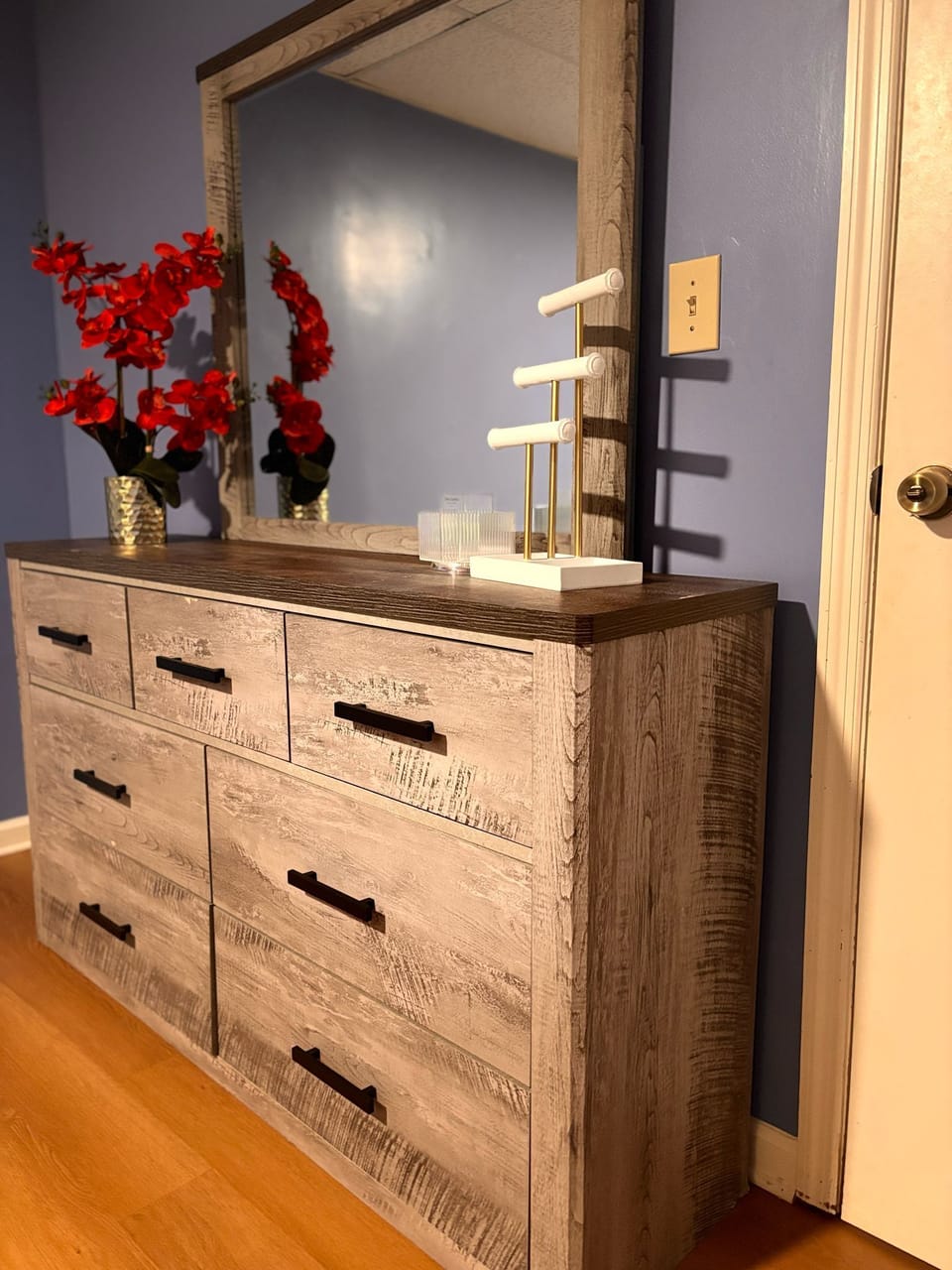 A closet with a mirror offers comfort and privacy for restful sleep.