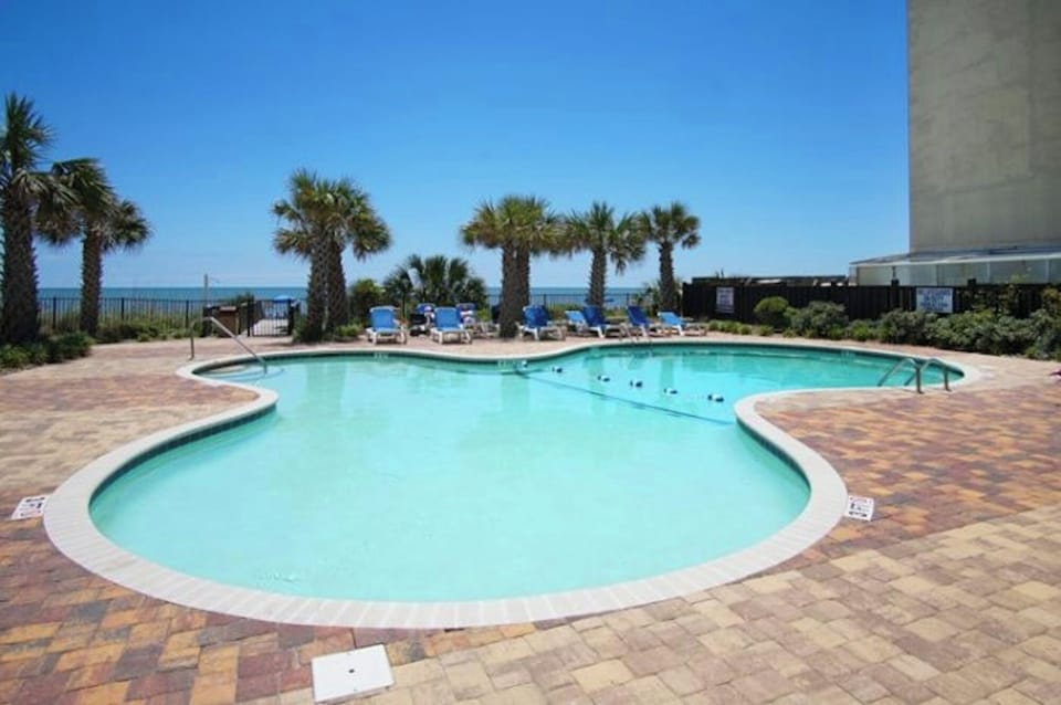 Take a cool dip in the pool after a fun day at the beach.