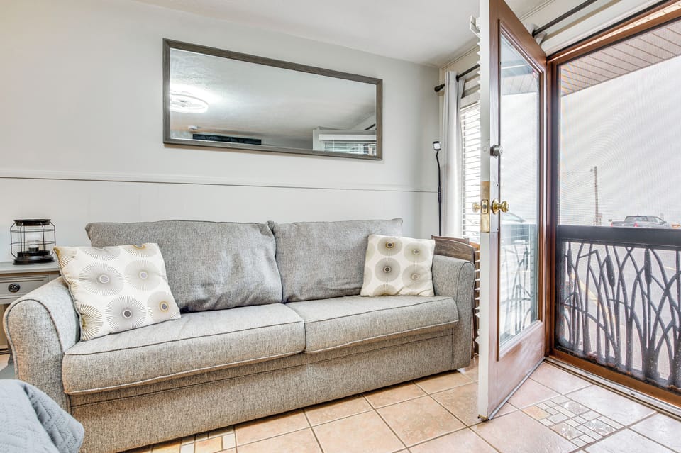 Studio | Living Area | Queen Sleeper Sofa | Electric Heating | Window A/C Unit