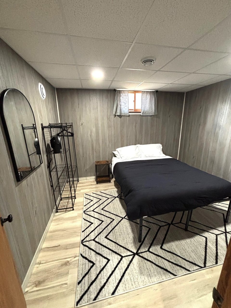 Basement bedroom w/ queen bed
