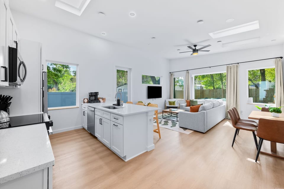 Open kitchen, dining and living room. Beautiful natural light