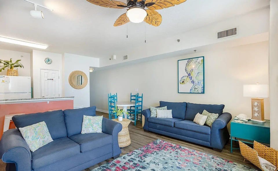 Living room with a sleeper sofa and smart TV