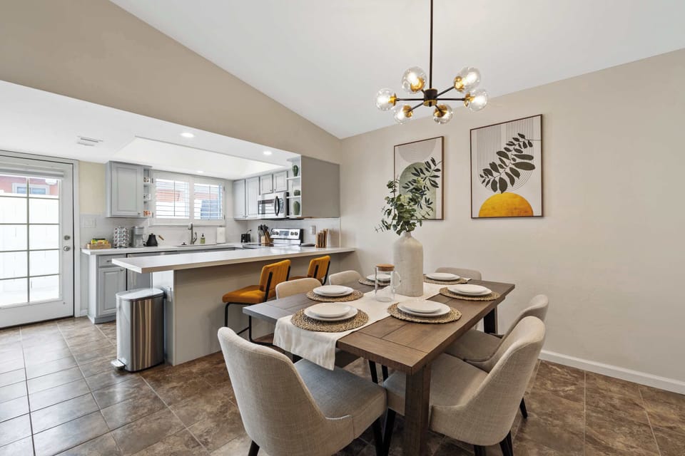 Enjoy the ease of entertaining with the kitchen and dining area flowing seamlessly together — perfect for serving up meals and making memories all in one cozy space.