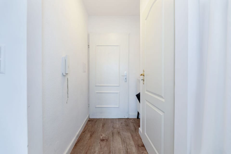  Bright and clean hallway leading to the studio entrance