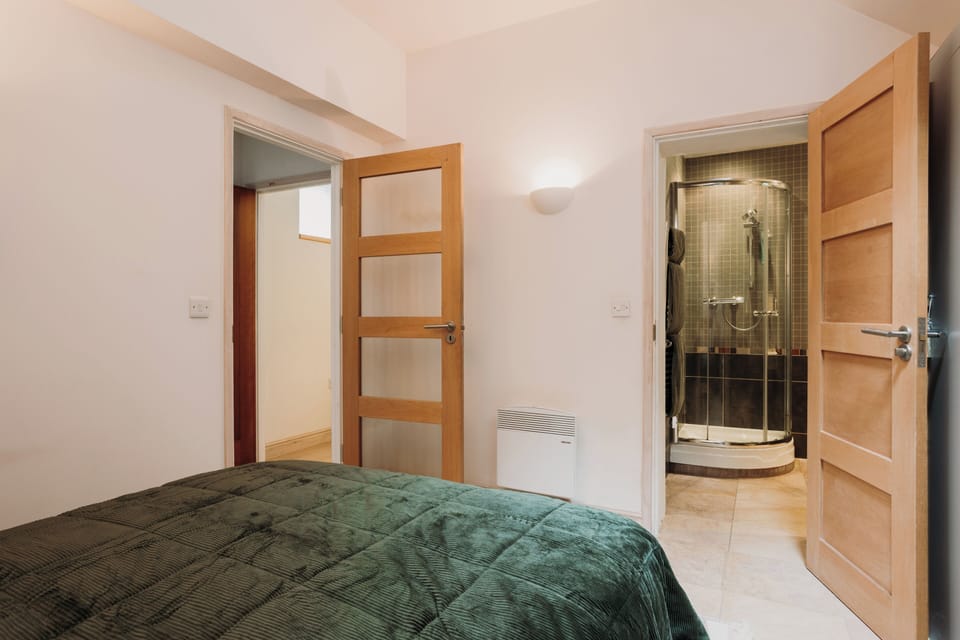Bedroom 1 with en-suite bathroom