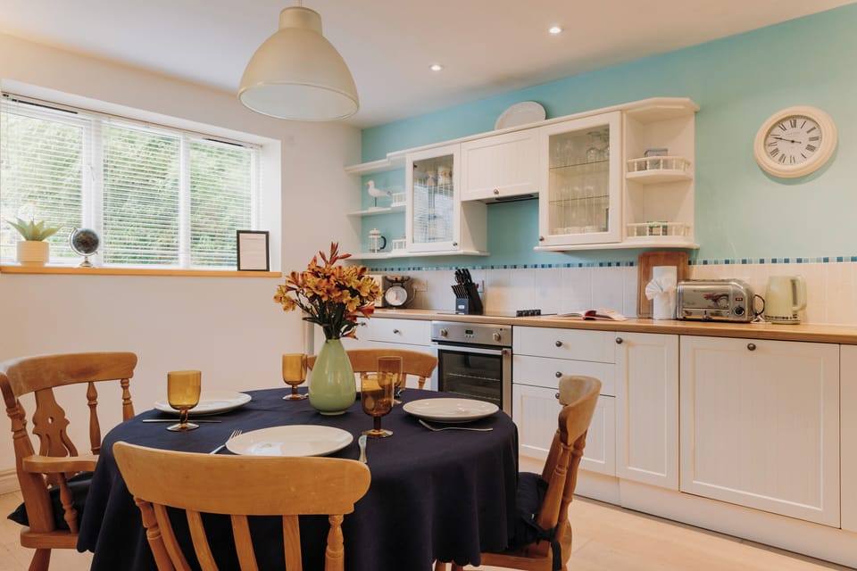 Gather for a cozy meal in this inviting dining space — perfect for relaxed evenings and great conversation.