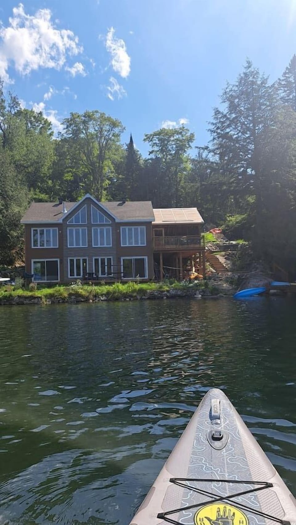 Paddling out on the lake and the view of the cottage