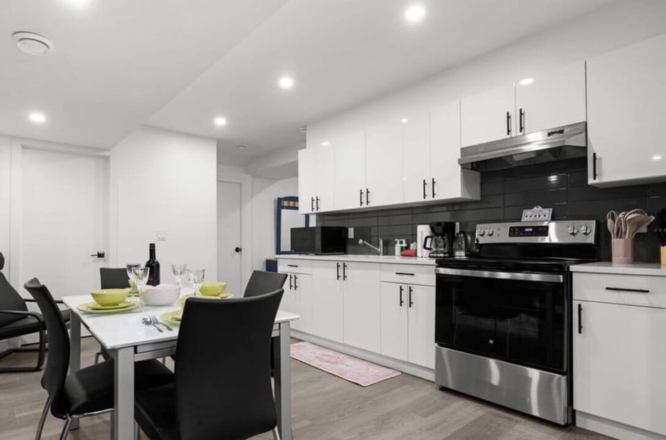 Easily prepare meals using the stovetop oven, microwave, and refrigerator available in the kitchen.