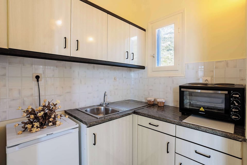 Bright and fully equipped kitchen for your culinary needs