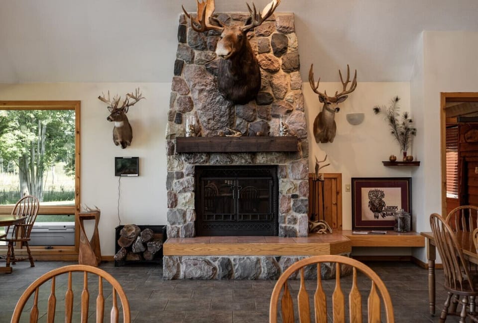 Enjoy warmth and comfort by the lodge’s fireplace.