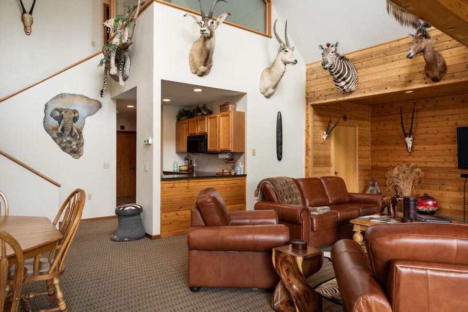 Open kitchen with ample seating and decorative touches.
