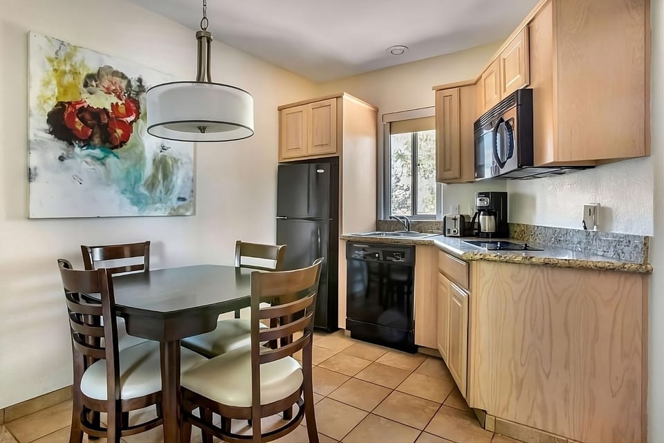 Sip morning coffee in a bright kitchen with dining nook.