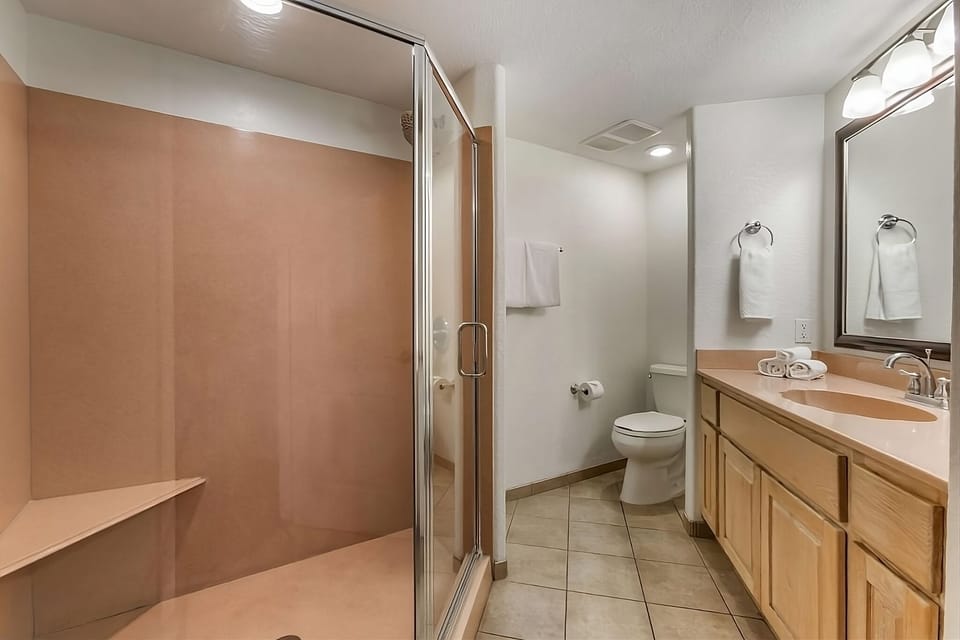 Refresh after adventures in a spacious walk-in shower.